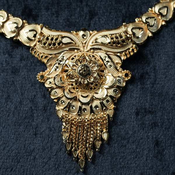 Beautiful Designer Golden Necklace Set With Elegant Pendant Earrings